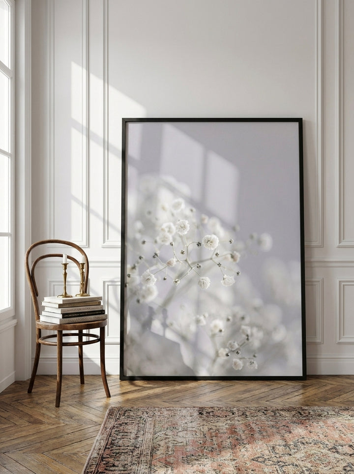 Oversized statement modern wall art print leaning against the wall in a Parisian dining room