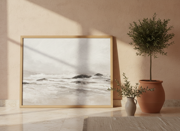 Modern wall art print leaning against the wall in a Mediterranean bathroom