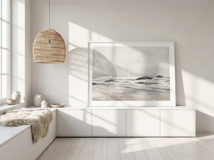 Modern wall art print standing on a sideboard in a bright Scandinavian home office