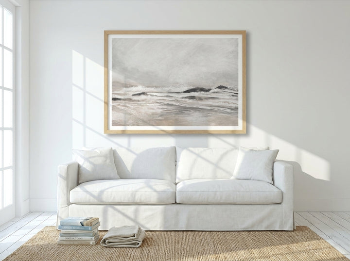 Modern wall art print styled on the wall in a coastal living room