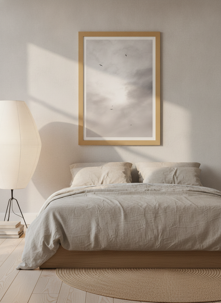 Modern wall art print styled on the wall in a warm Japandi bedroom
