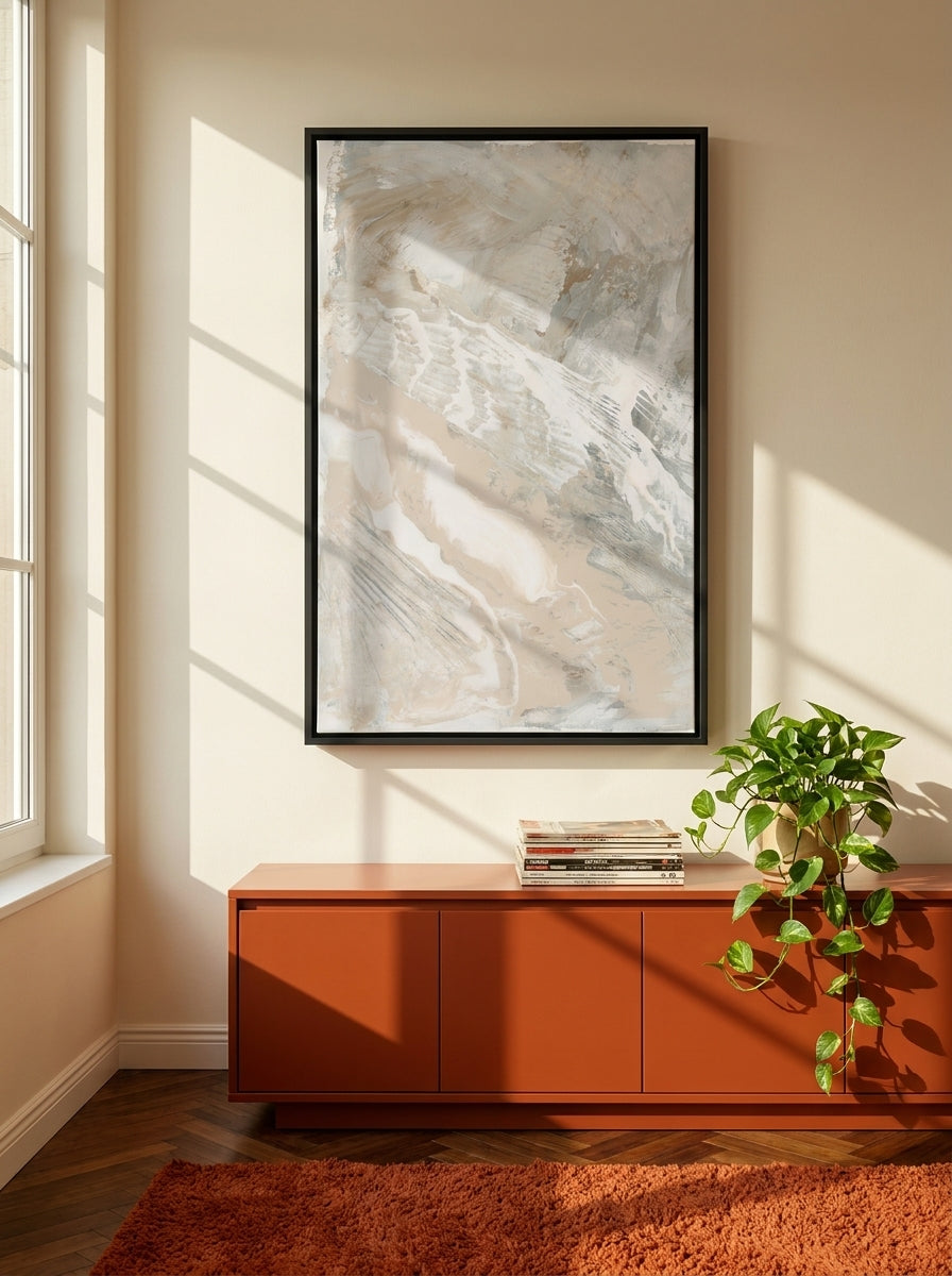 Canvas wall art with a black surround styled on the wall in a retro 70s living room