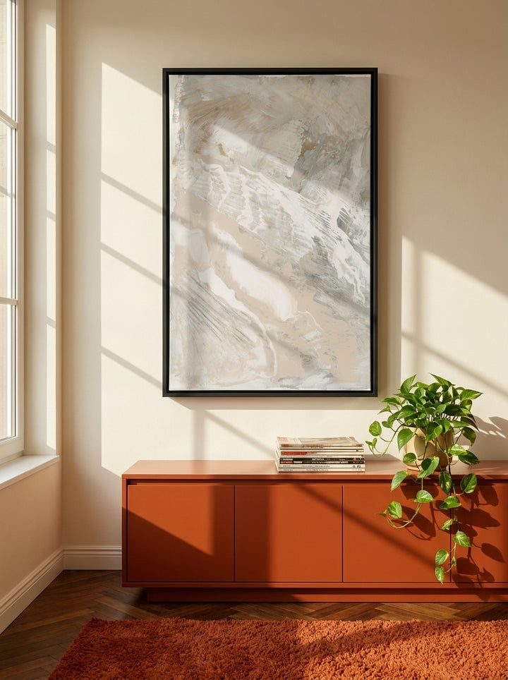Canvas wall art with a black surround styled on the wall in a retro 70s living room