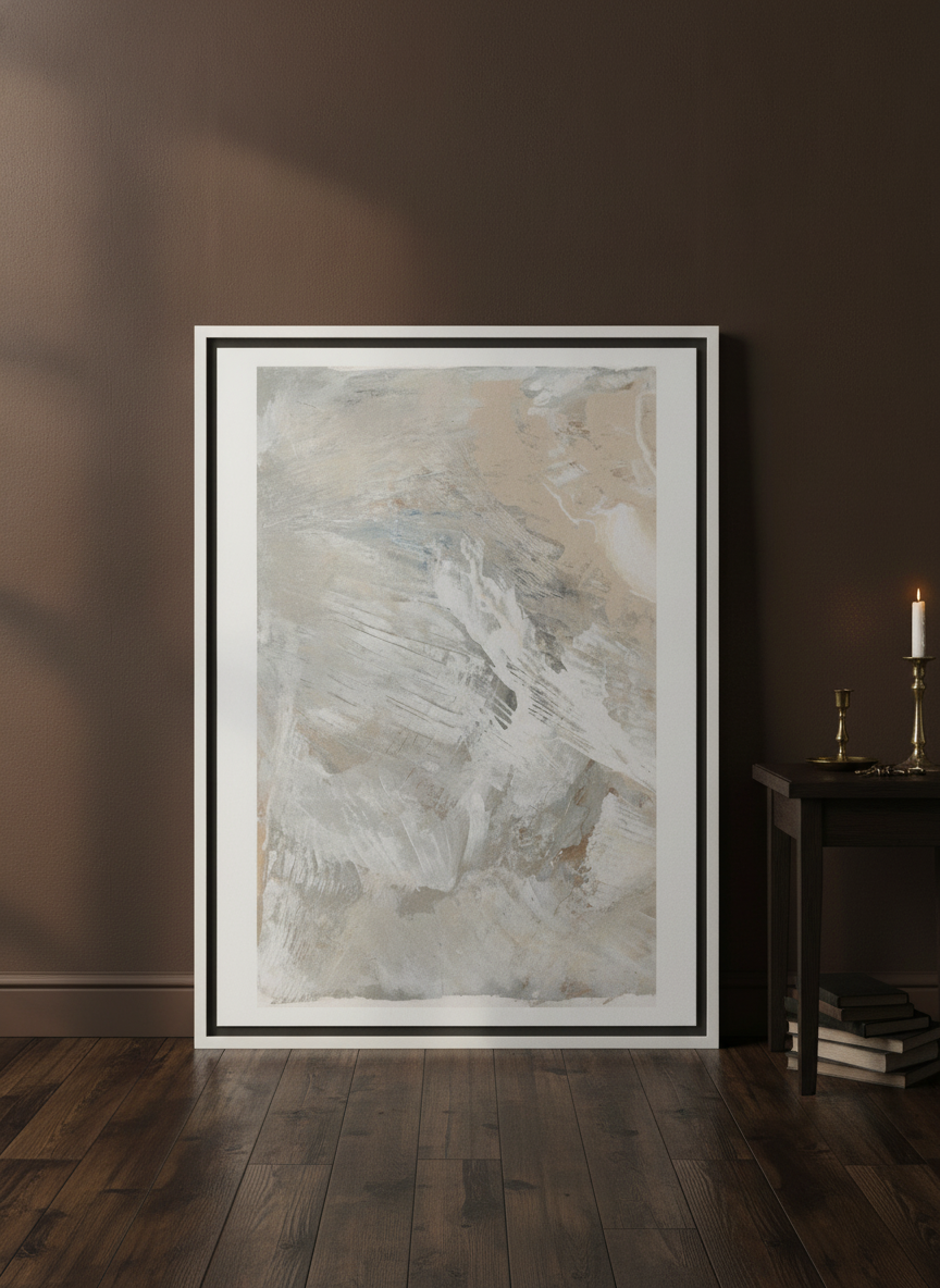 Canvas wall art with a white surround leaning against the wall in a moody dining room