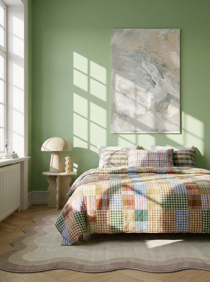 Stretched canvas wall art styled on the wall in a colourful eclectic bedroom