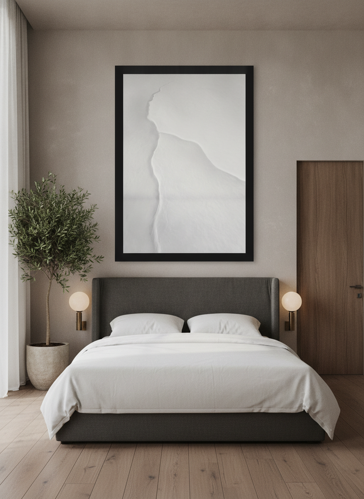 Oversized statement modern wall art print styled on the wall in a luxe bedroom