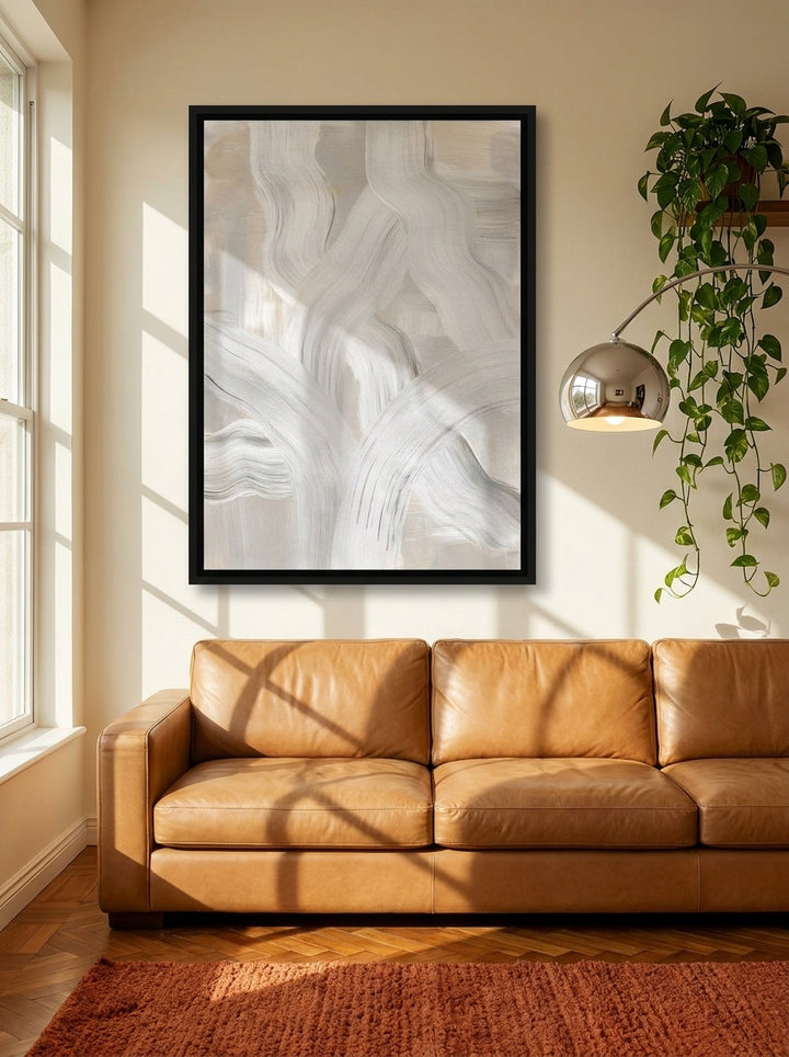 Canvas wall art with a black surround styled on the wall in a retro 70s living room