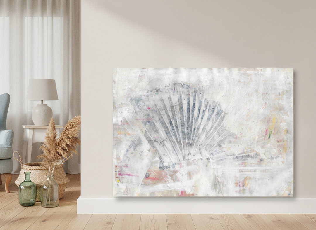 Stretched canvas wall art leaning against the wall in a coastal home office