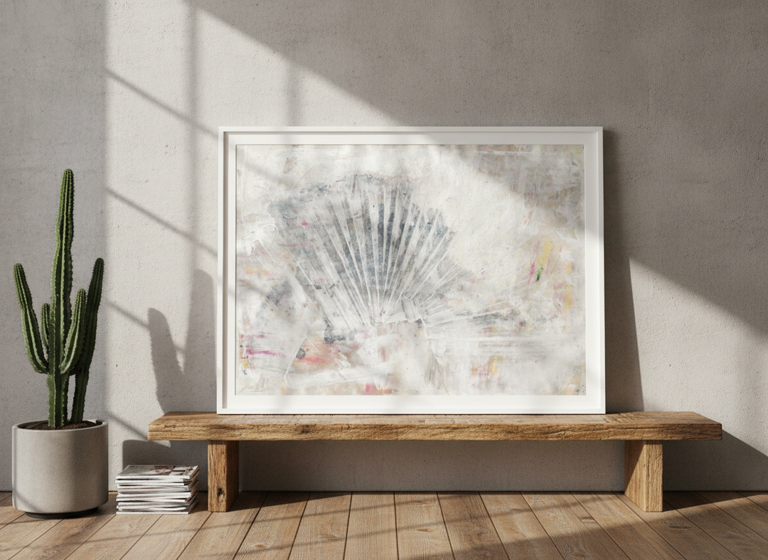 Modern wall art print standing on a bench in an industrial loft bedroom