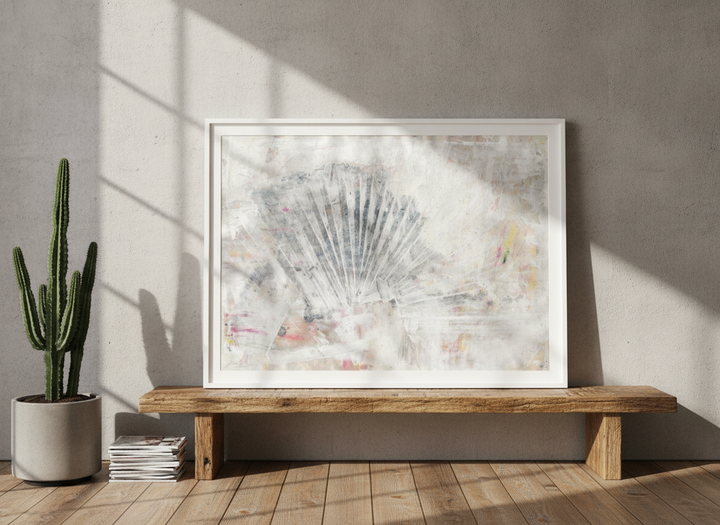 Modern wall art print standing on a bench in an industrial loft bedroom