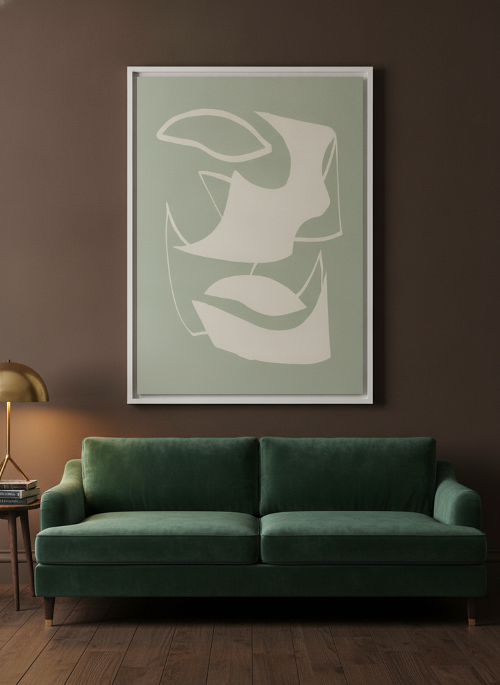 Oversized statement canvas wall art with a white surround styled on the wall in a moody living room