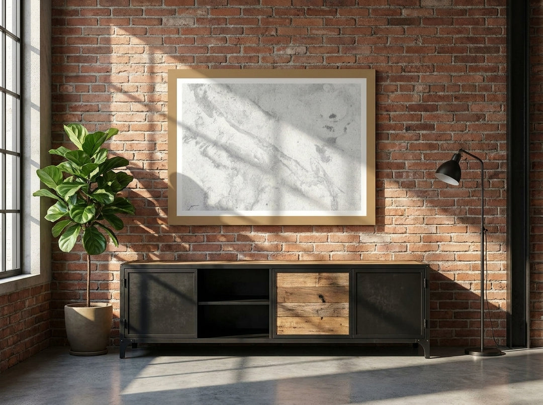Modern wall art print styled on the wall in an industrial loft living room