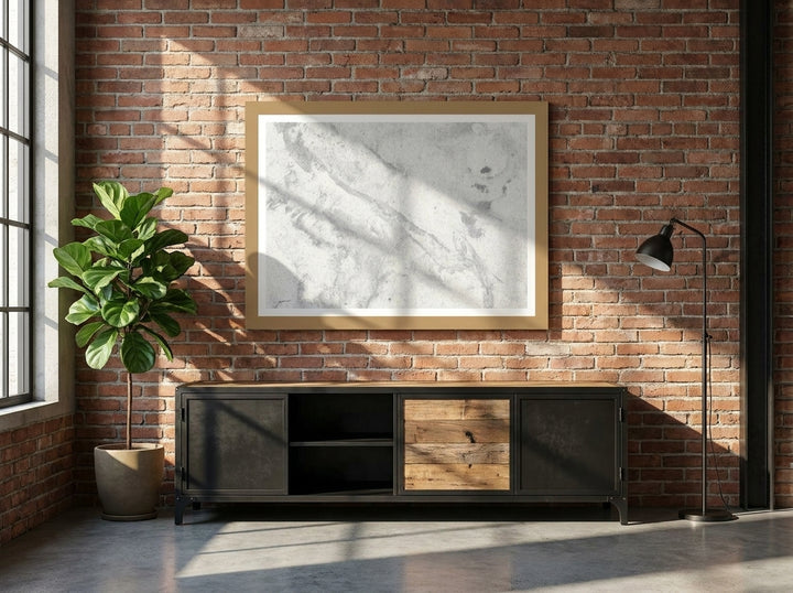 Modern wall art print styled on the wall in an industrial loft living room