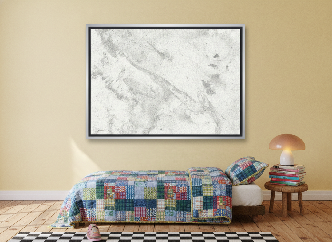 Canvas wall art with a silver leaf surround styled on the wall in a colourful eclectic bedroom