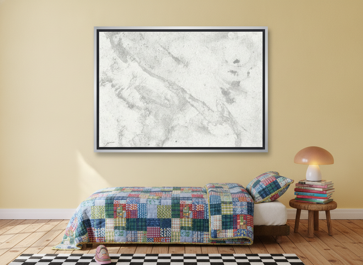 Canvas wall art with a silver leaf surround styled on the wall in a colourful eclectic bedroom