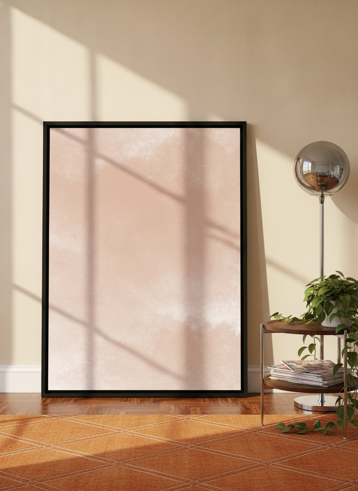 Canvas wall art with a black surround leaning against the wall in a retro 70s home office