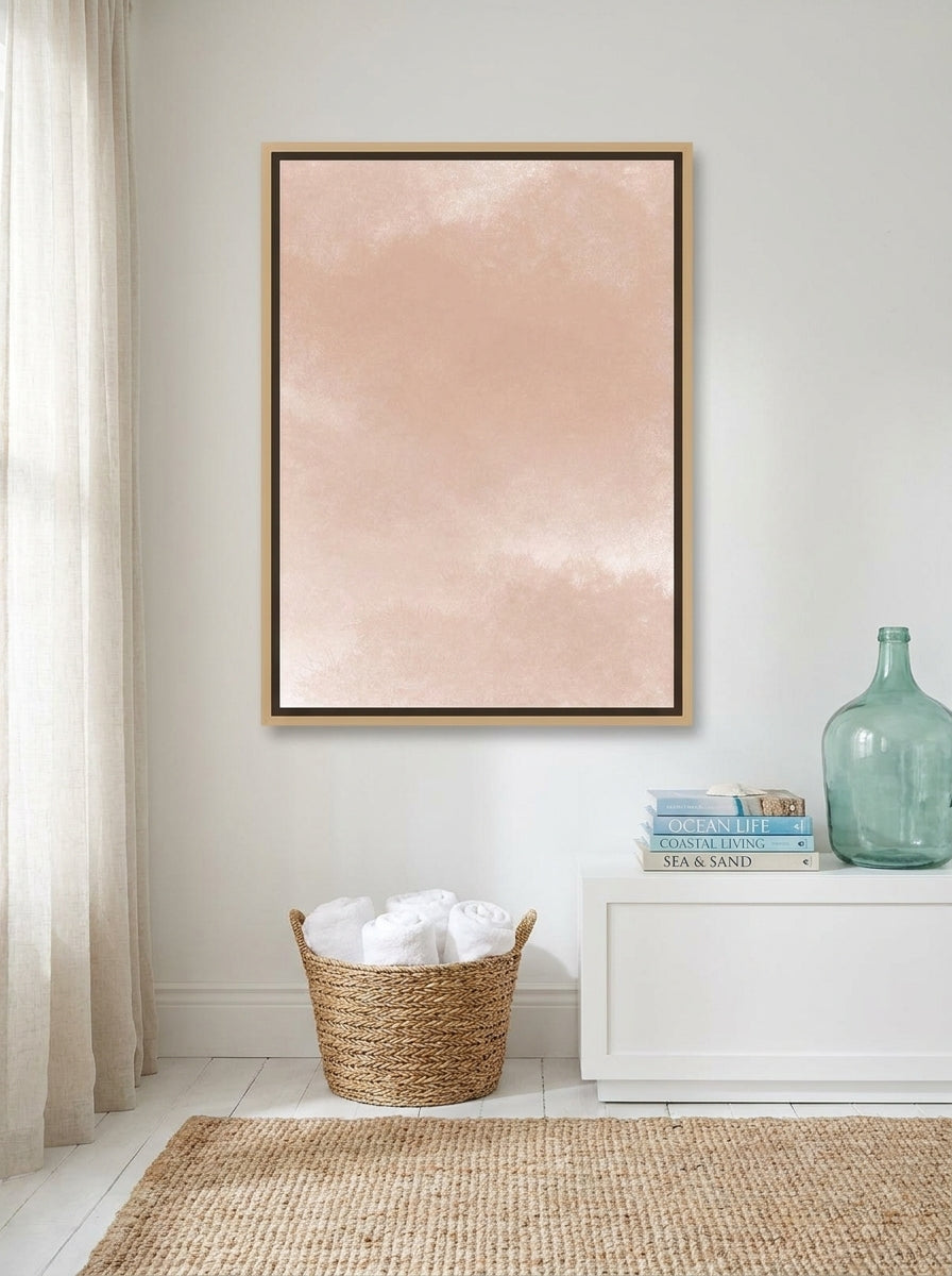 Canvas wall art with a natural timber surround styled on the wall in a coastal bathroom