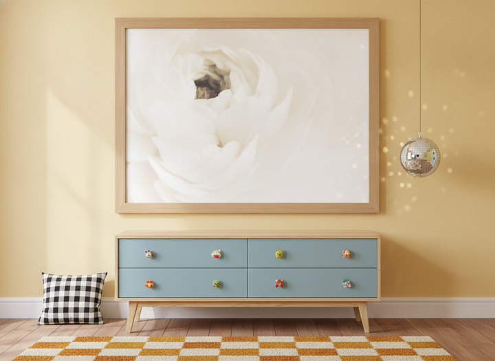 Modern wall art print styled on the wall in a colourful eclectic nursery