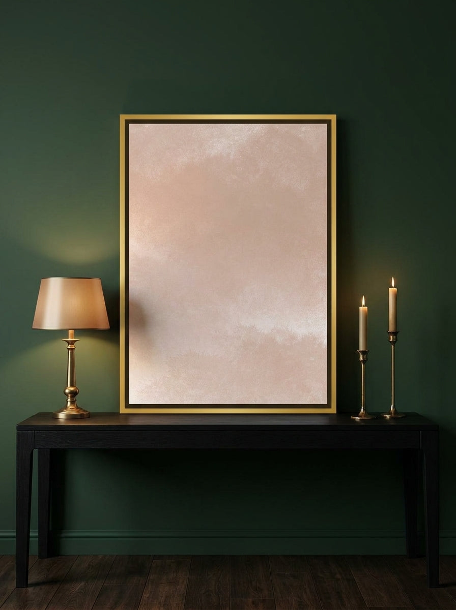 Canvas wall art with a gold leaf surround standing on a console in a moody bedroom