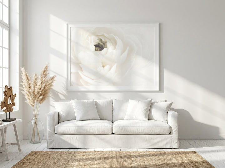 Oversized statement modern wall art print styled on the wall in a coastal living room