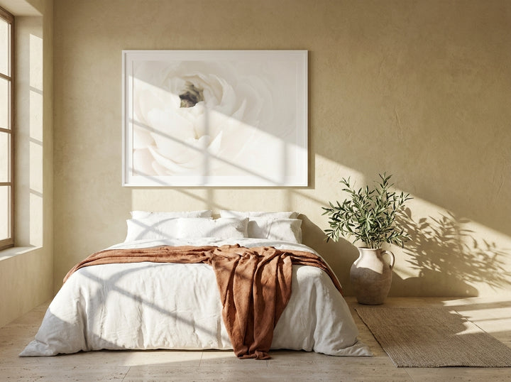 Modern wall art print styled on the wall in a Mediterranean bedroom