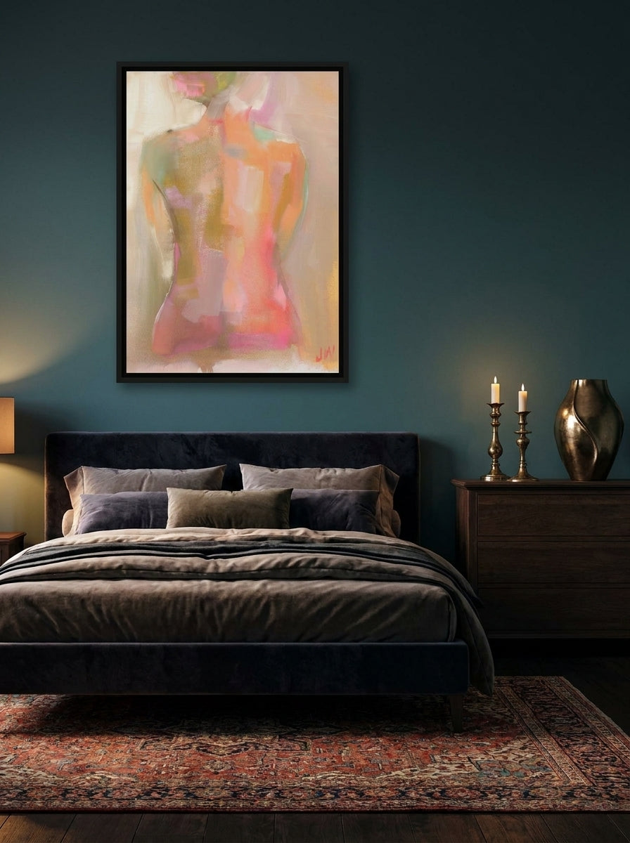Canvas wall art with a black surround styled on the wall in a moody bedroom