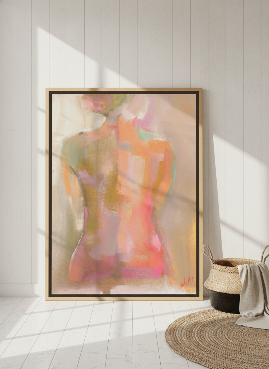 Oversized statement canvas wall art with a natural timber surround leaning against the wall in a coastal home office