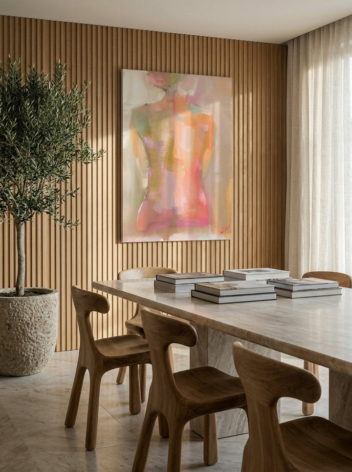 Stretched canvas wall art styled on the wall in a luxe dining room