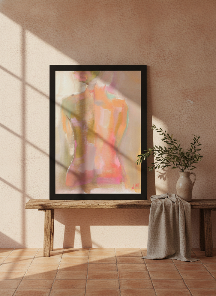 Modern wall art print standing on a bench in a Mediterranean bedroom