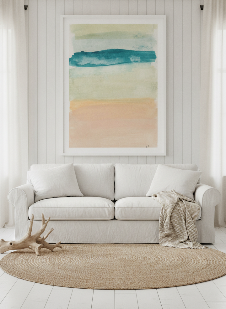 Oversized statement modern wall art print styled on the wall in a coastal living room