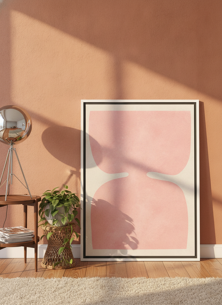 Canvas wall art with a white surround leaning against the wall in a retro 70s home office