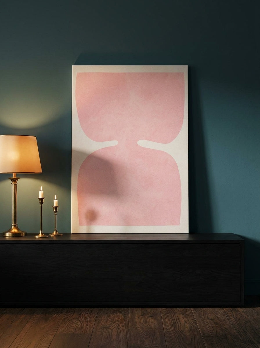 Stretched canvas wall art standing on a console in a moody living room