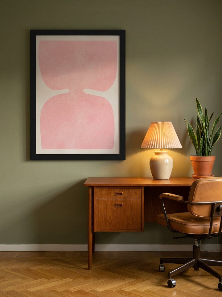 Modern wall art print styled on the wall in a mid-century home office