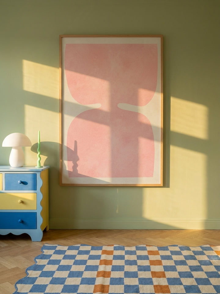 Oversized statement modern wall art print styled on the wall in a colourful eclectic nursery