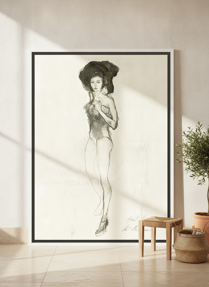 Oversized statement canvas wall art with a white surround leaning against the wall in a Mediterranean living room