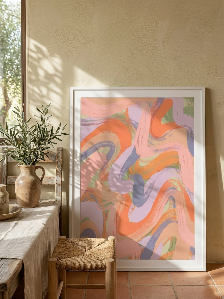 Modern wall art print leaning against the wall in a Mediterranean living room
