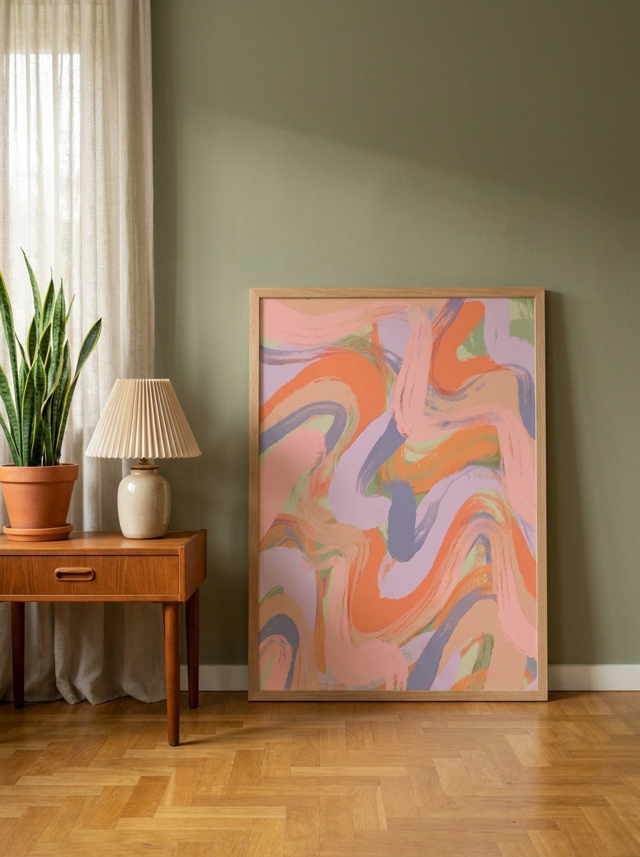 Modern wall art print leaning against the wall in a mid-century home office
