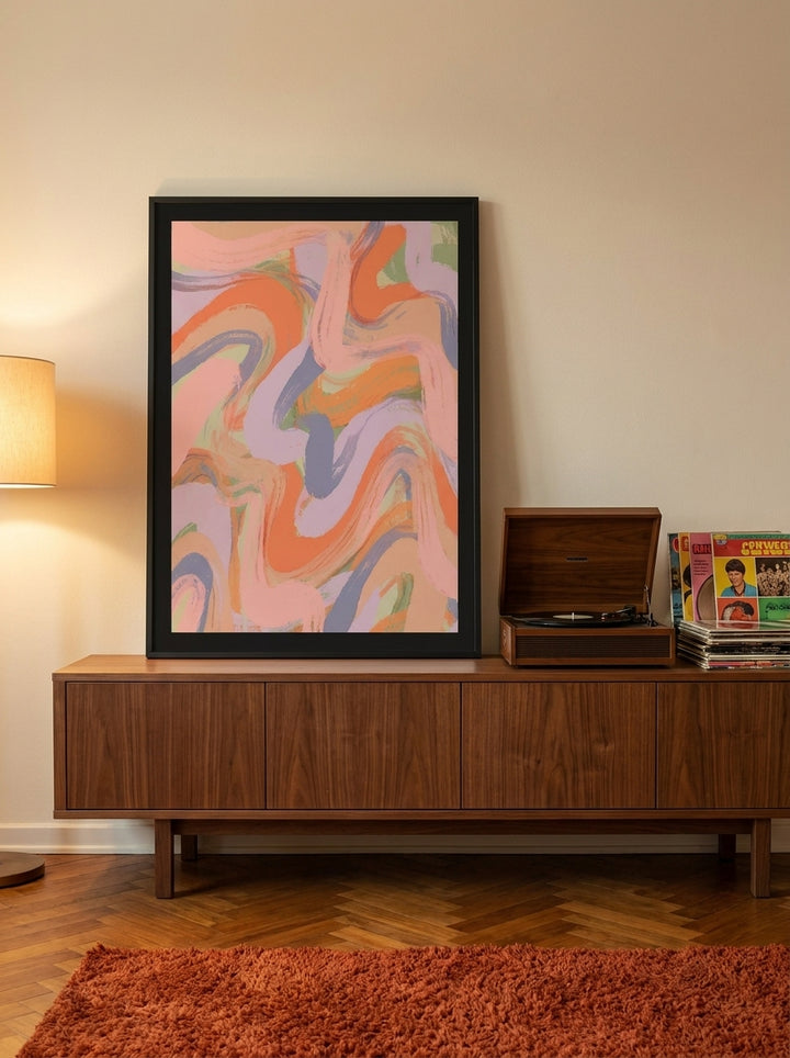 Modern wall art print standing on a sideboard in a retro 70s bedroom