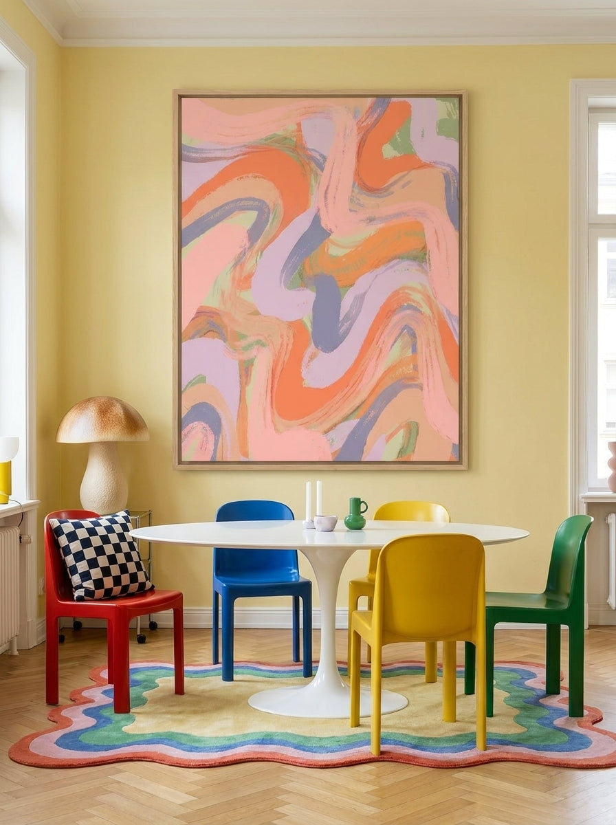 Oversized statement canvas wall art with a natural timber surround styled on the wall in a colourful eclectic dining room
