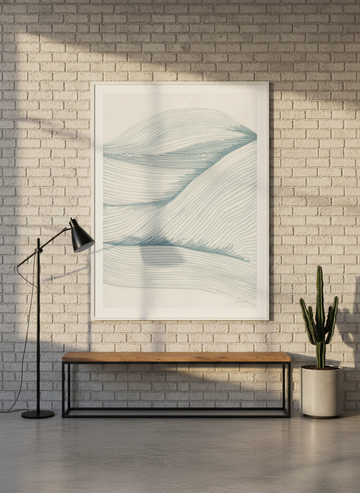 Oversized statement modern wall art print styled on the wall in an industrial loft living room