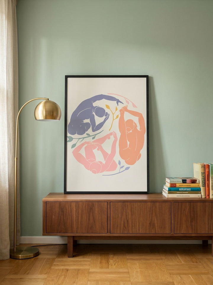 Modern wall art print standing on a sideboard in a mid-century living room