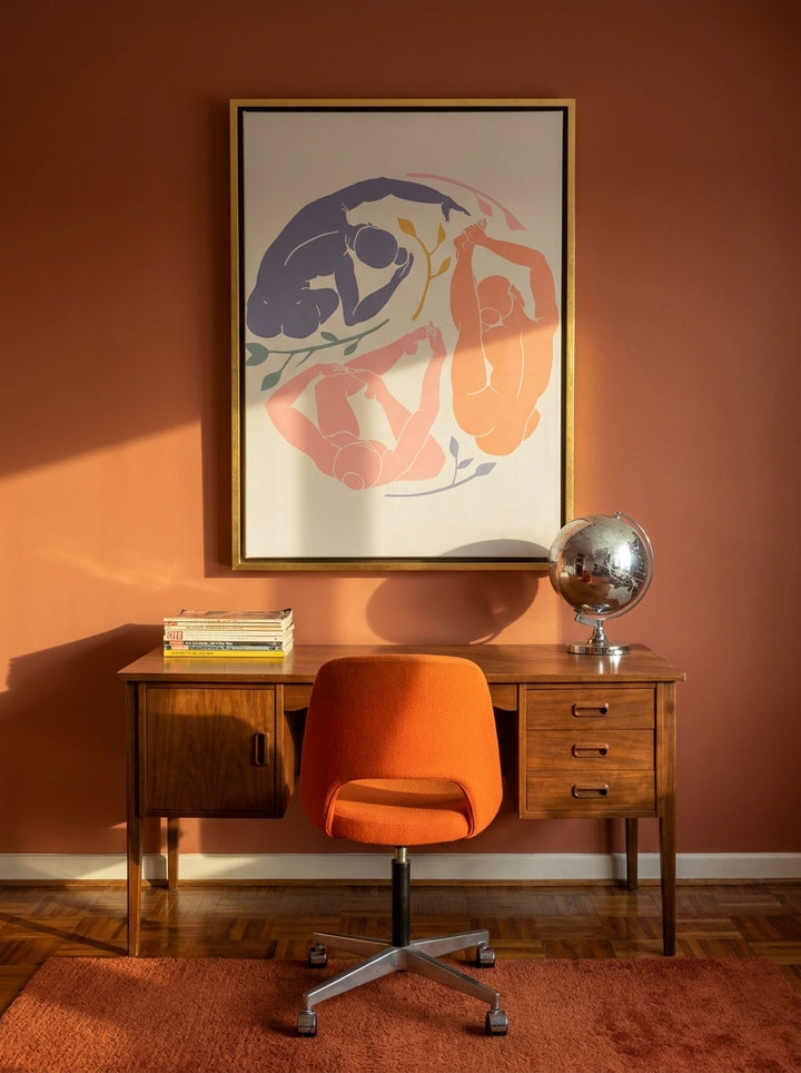 Canvas wall art with a gold leaf surround styled on the wall in a retro 70s home office
