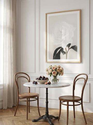 Modern wall art print styled on the wall in a Parisian dining room