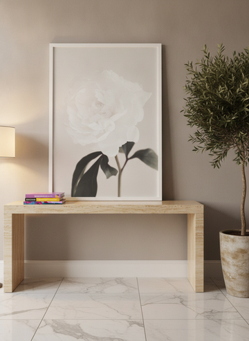 Modern wall art print standing on a console in a luxe home office