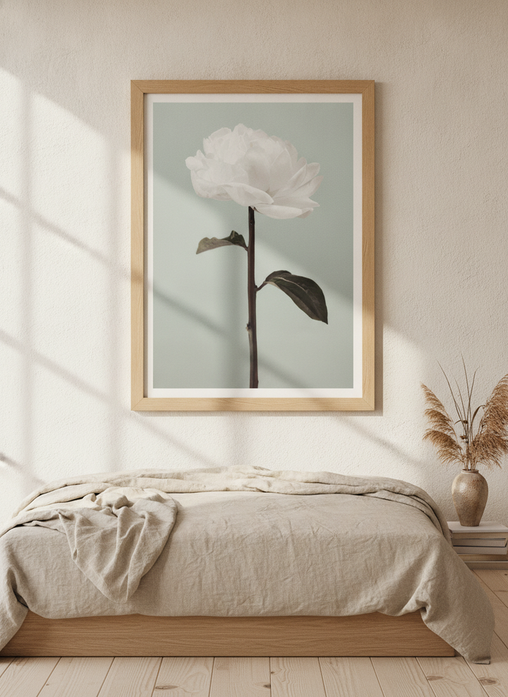 Modern wall art print styled on the wall in a warm Japandi bedroom