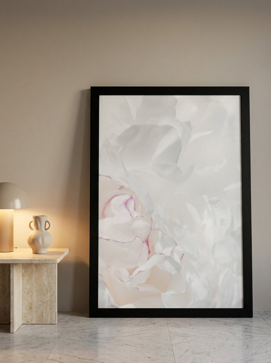 Oversized statement modern wall art print leaning against the wall in a luxe dining room