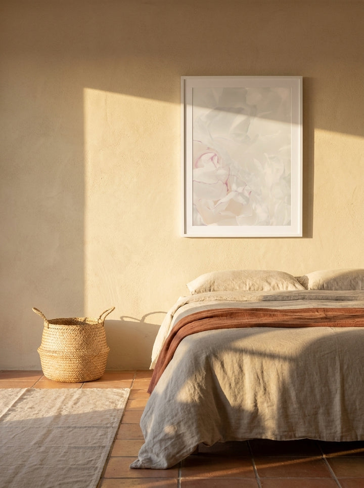 Modern wall art print styled on the wall in a Mediterranean bedroom