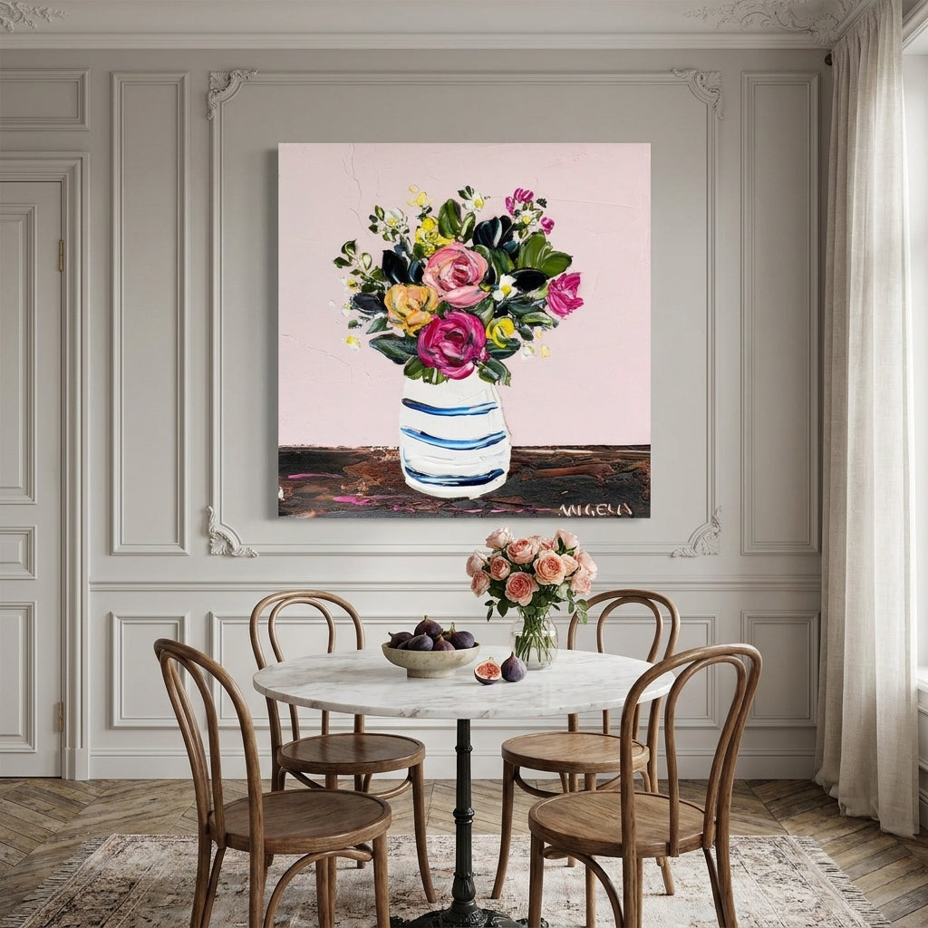 Stretched canvas wall art styled on the wall in a Parisian dining room