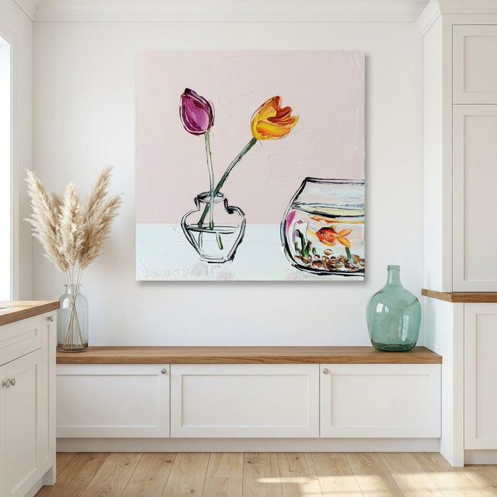 Stretched canvas wall art styled on the wall in a coastal kitchen