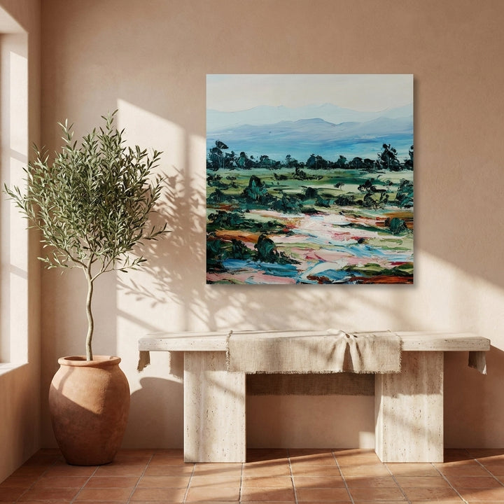 Stretched canvas wall art styled on the wall in a Mediterranean living room
